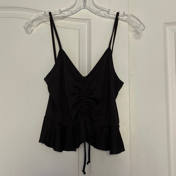 Blank sleeveless top with flare and adjustable tie in front - Picture 1 of 1